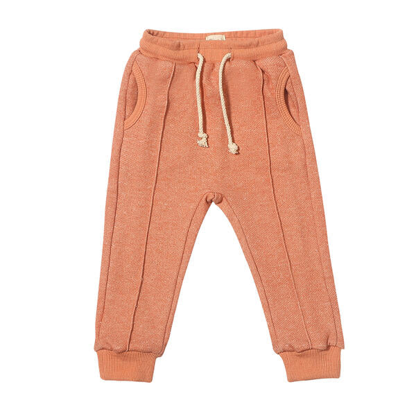 rust sweat pants with side pickets and front line detail 