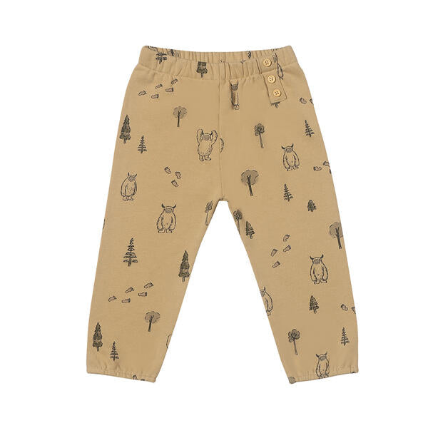 sweat pants in beige with yeti print 3 button detail 