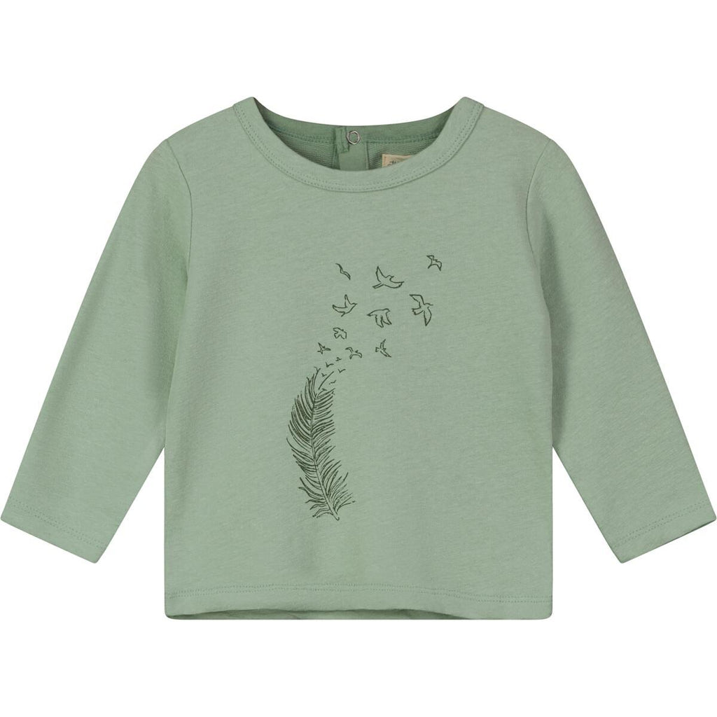 long sleeve green tee with feather print and flying birds